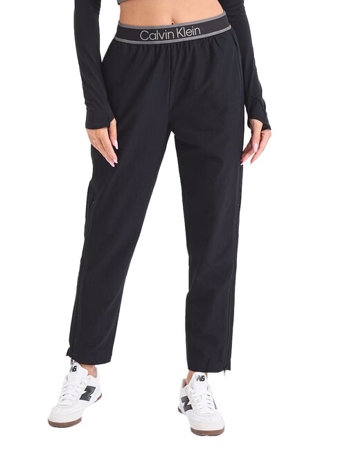 CALVIN KLEIN CK PERFORMANCE Tracksuit bottoms with zips black beauty - Sports suits for women