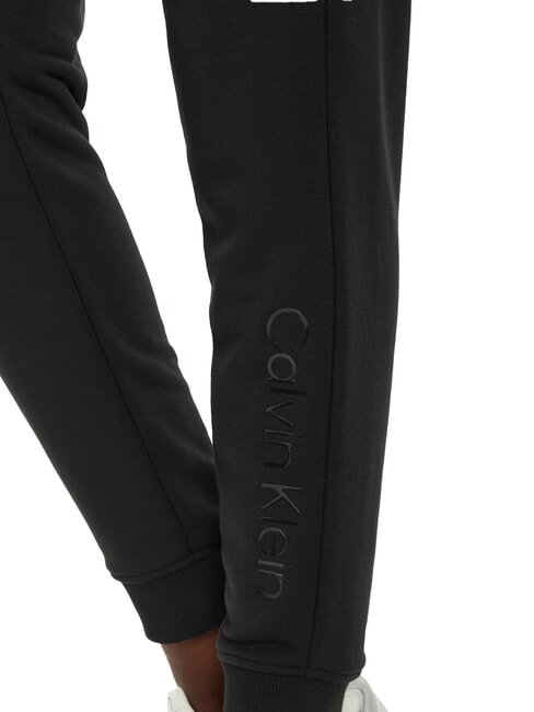CK PERFORMANCE Elastic ankle tracksuit trousers black beauty - Sports suits for women
