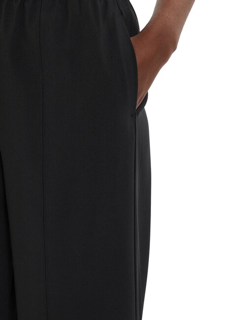 CK PERFORMANCE Palazzo trousers with logo elastic black beauty - Sports suits for women