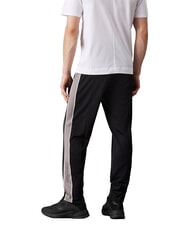 CALVIN KLEIN CK PERFORMANCE Tracksuit bottoms with side logo - Men's sports suits