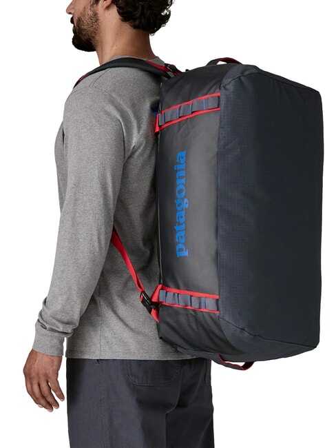 BLACK HOLE 55L travel backpack bag smolder blue with red amanita - Duffle bags