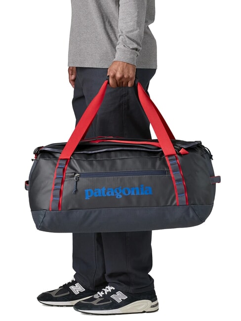 BLACK HOLE 55L travel backpack bag smolder blue with red amanita - Duffle bags